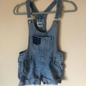 blue denim overalls with patches